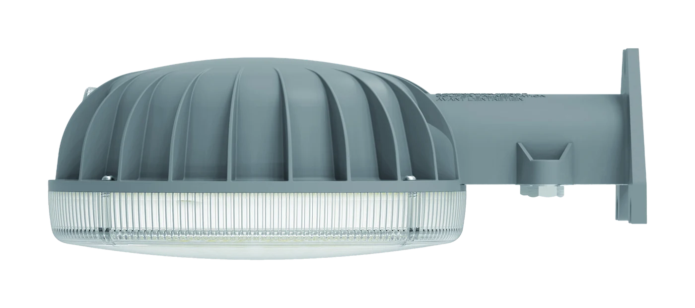 Grey LED dusk-to-dawn area light on a wall arm