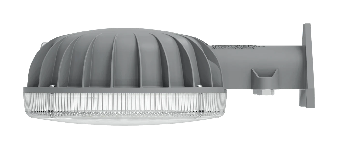 Grey LED dusk-to-dawn area light on a wall arm