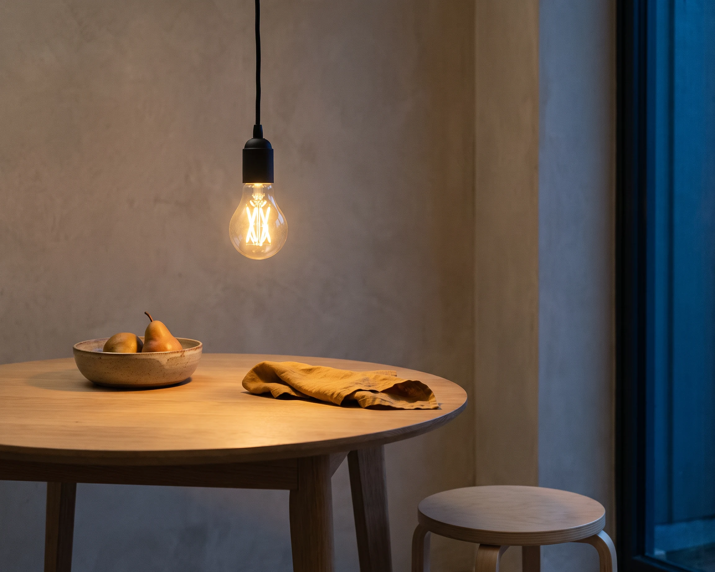 A19 filament LED bulb, shown in a typical installation (illustration)